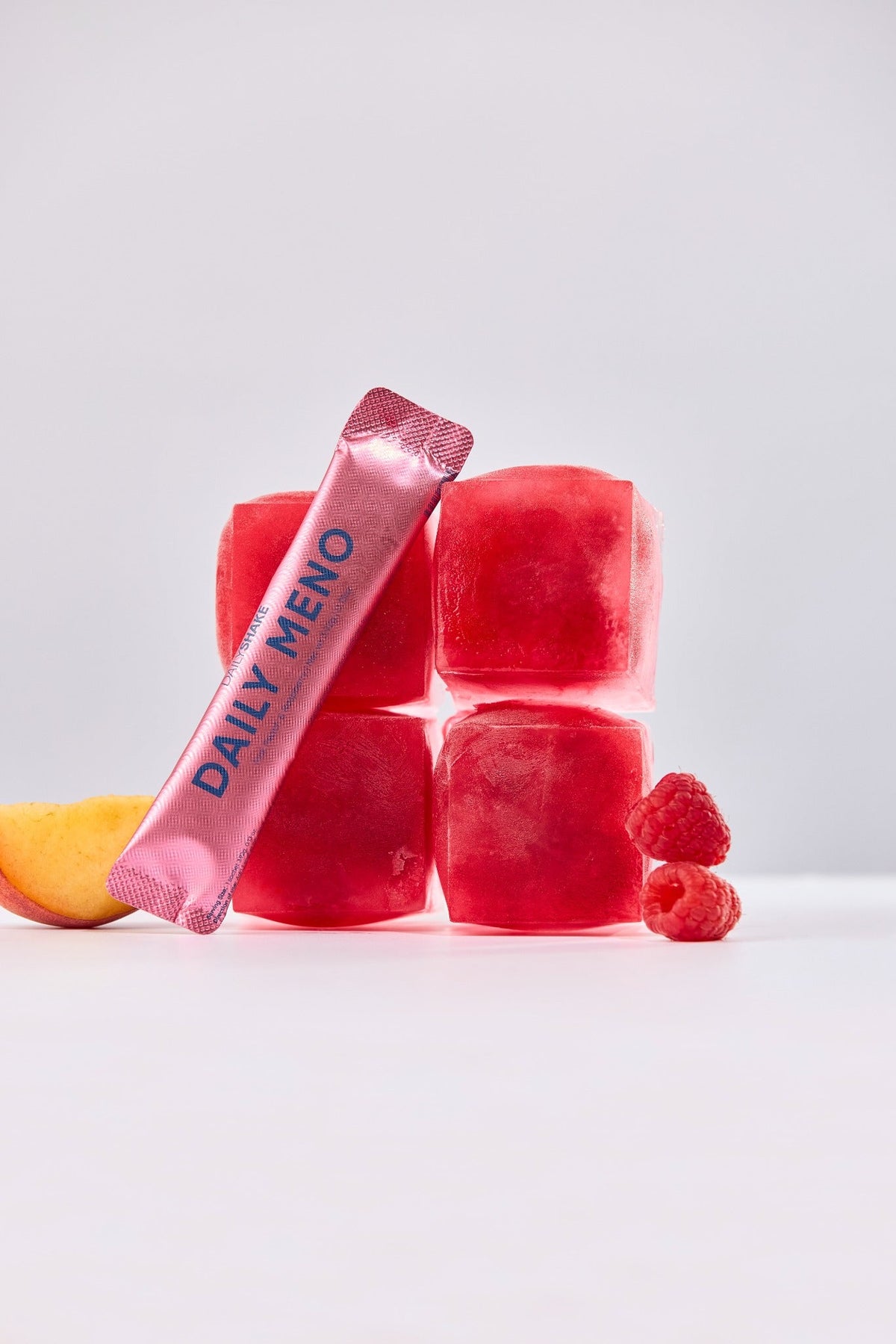 Daily Meno Peach Raspberry sachet with peach raspberry ice